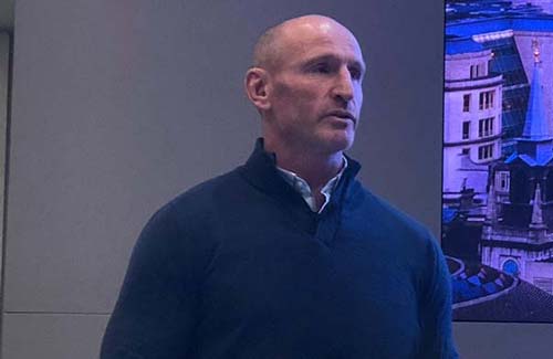 Gareth Thomas speaking on stage.