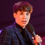 Suzi Ruffell speaking on stage