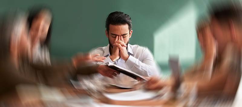 Stressed man at desk