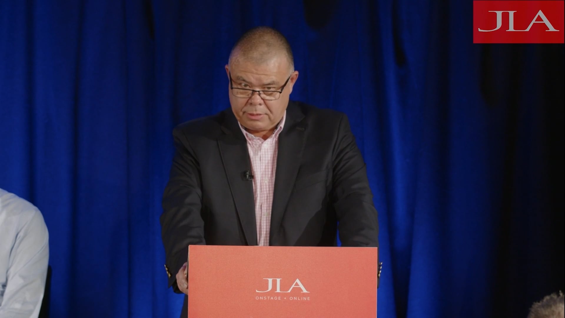 Jonathan Van-Tam speaking on stage about leadership