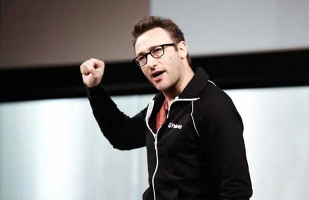 Simon Sinek speaking on stage.