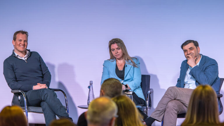AI Speakers on stage at breakfast event