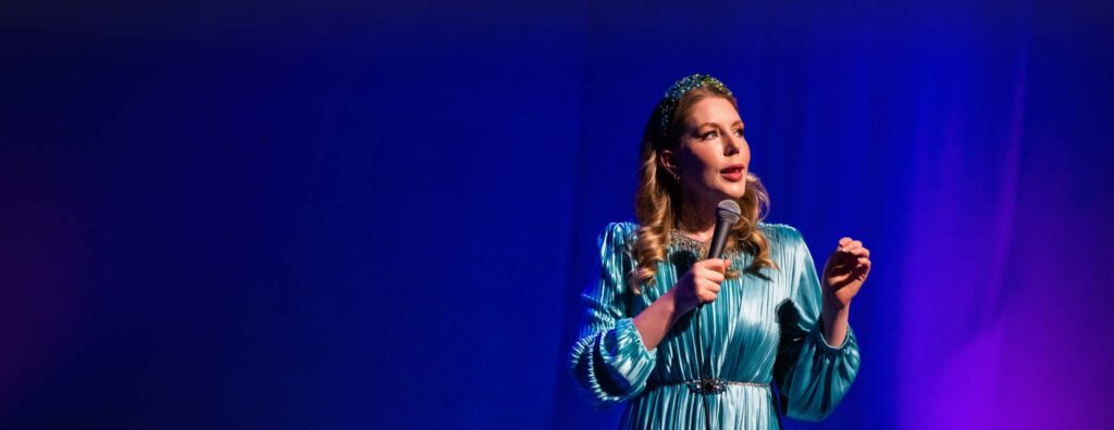 Katherine Ryan speaking on stage.