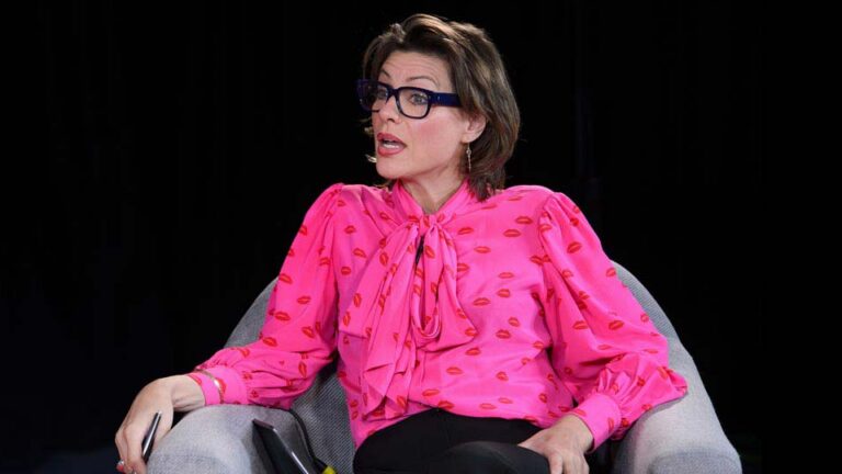 Kate Silverton speaking on a stage.