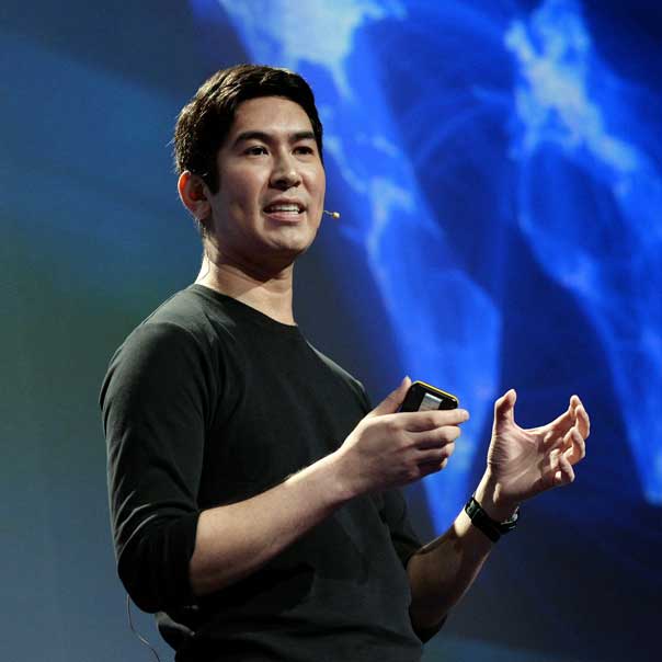 Dex Hunter-Torricke speaking on a stage.