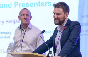 Jonny Benjamin & Neil Laybourn speaking on stage