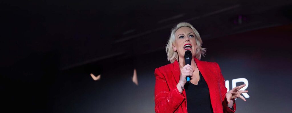 Steph Mcgovern speaking on a stage.