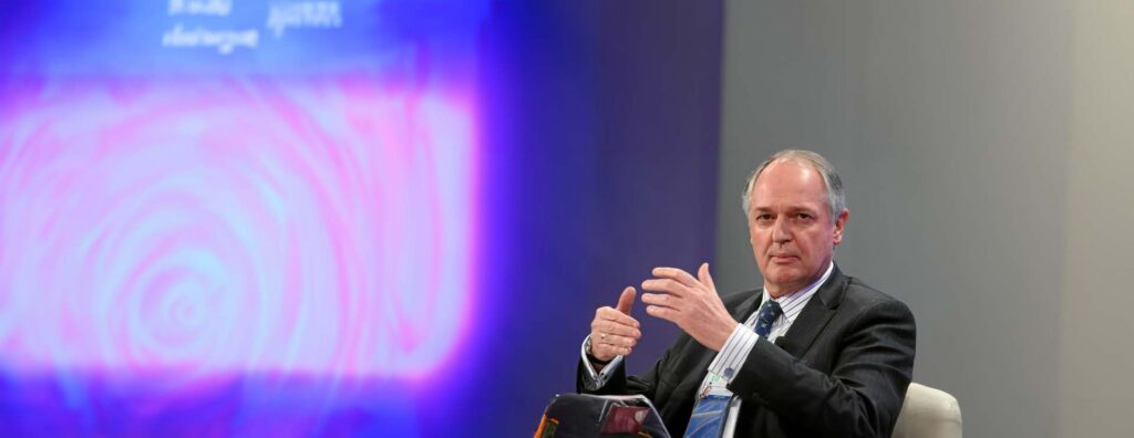 Paul Polman speaking on a stage.