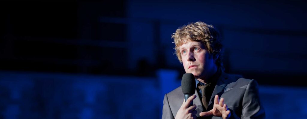 Josh Widdicombe on stage