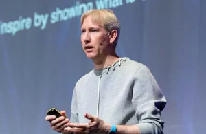 Matthew Drinkwater speaking on stage