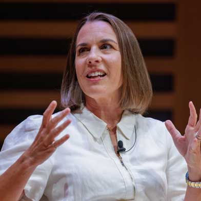 Claire Williams speaking on stage