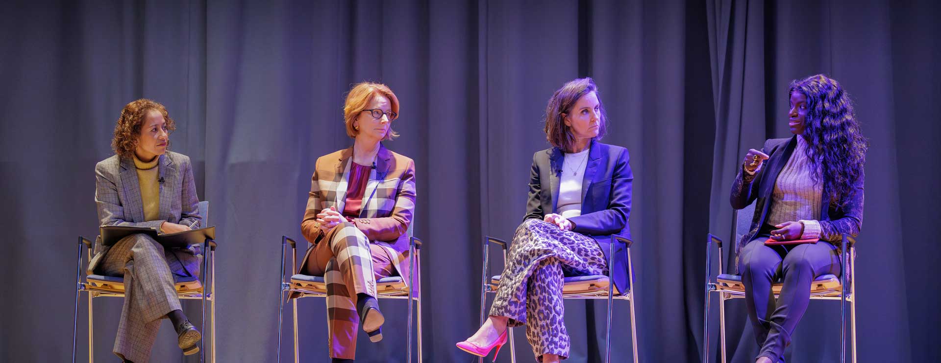 Speakers on stage at JLA's Speakers Breakfast: Looking ahead to IWD