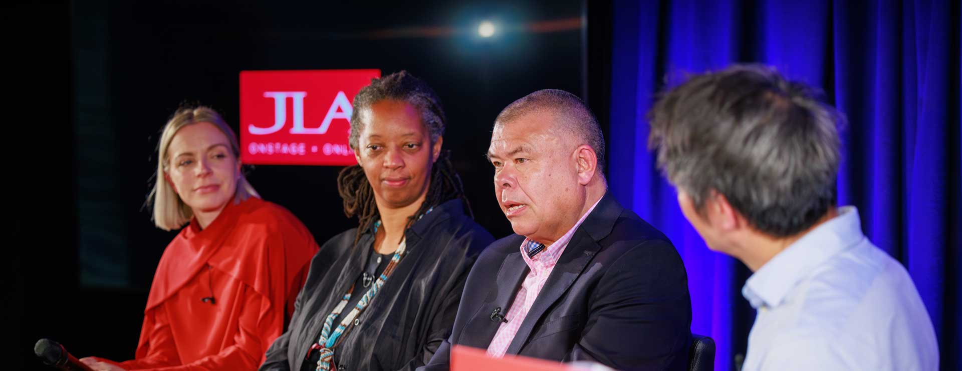 Leadership Under Pressure speakers on stage