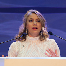 Sarah Smith Speaking on stage